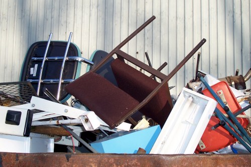 Professional home clearance team in Archway removing furniture