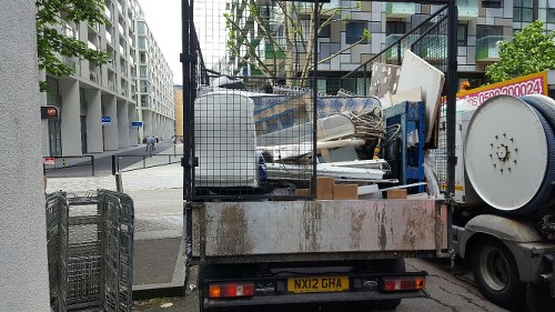 Clearance team assessing furniture for removal